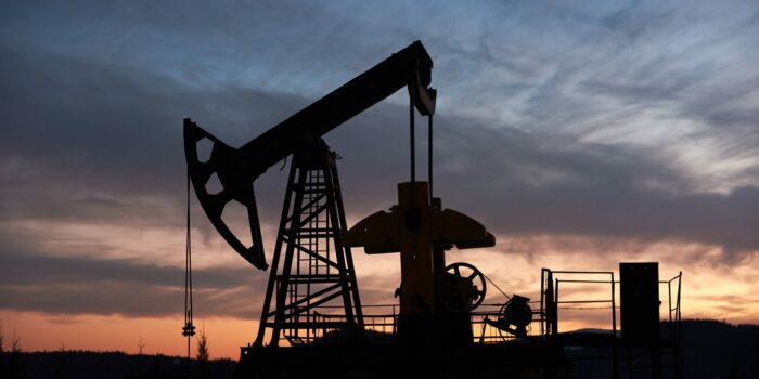 1-beautiful-sunset-over-oil-field-with-pump-jack-scaled